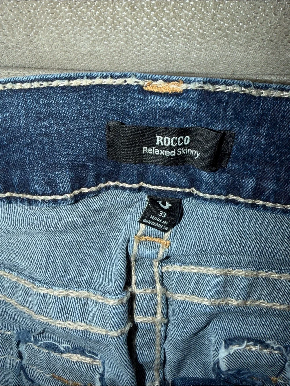 True Religion Dark Blue Jeans with Signature Pocket Stitching